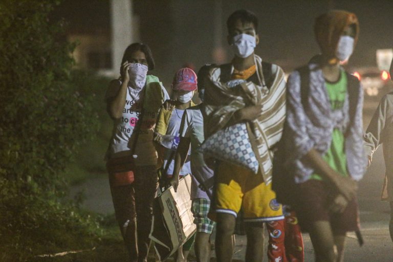 People leaving their homes after Taal volcano eruption