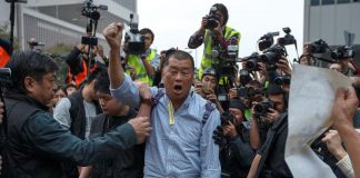 Hong Kong media tycoon Jimmy Lai arrested on illegal assembly charges