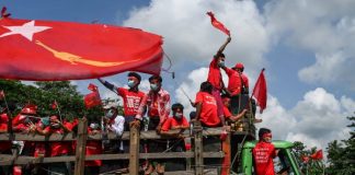 (NLD) party take part in an election campaign rally