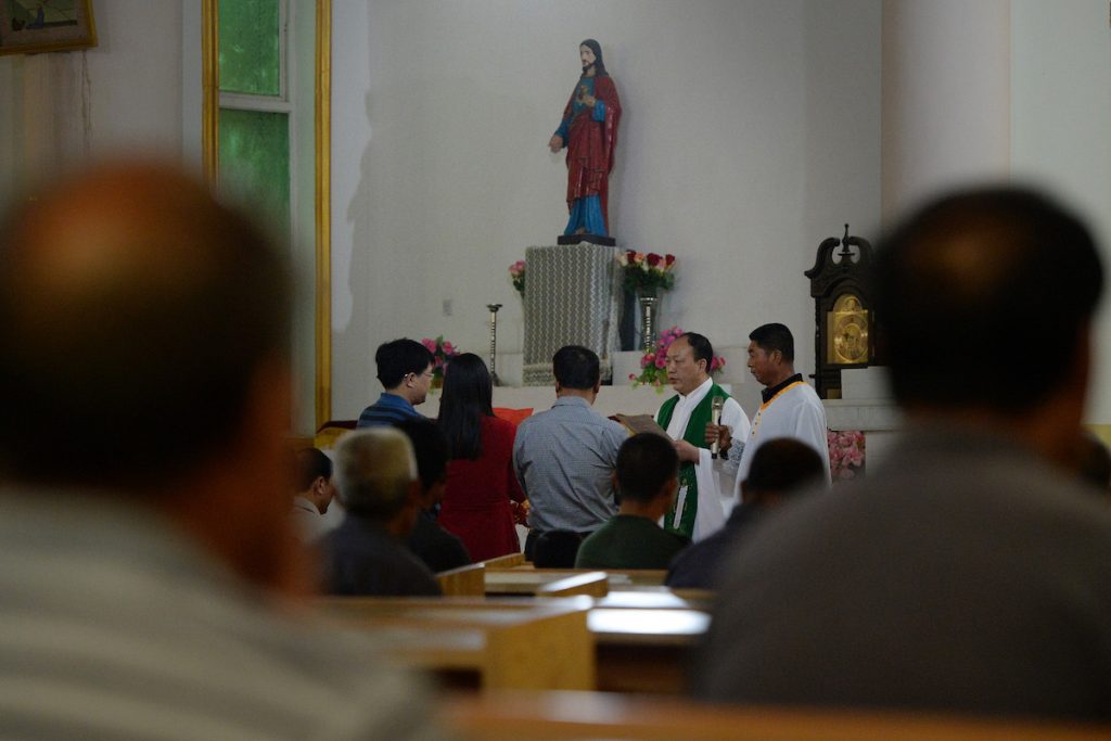 Chinese Catholics in underground church