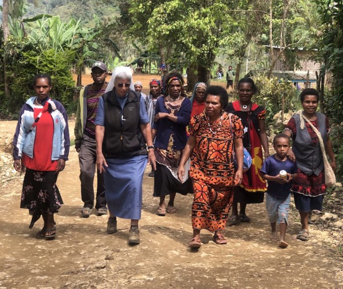 Sister Lorena Jenal with villagers