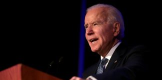 Joe Biden addressing audience from a lectern | Licas News