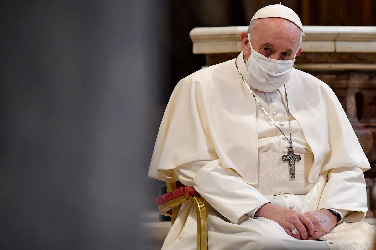 Pope Francis wearing white face mask