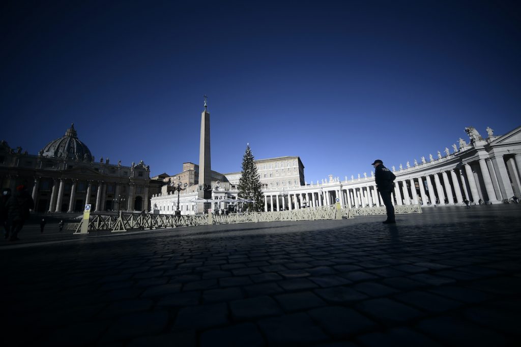 Lone policeman in an empty St. Peter's Square