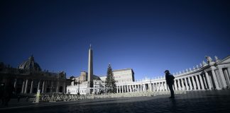 Lone policeman in an empty St. Peter's Square