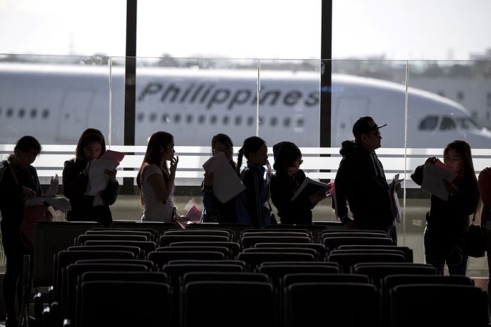 Filipino workers returning home from Kuwait