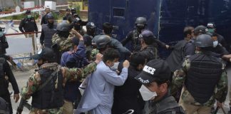 Policemen arrest doctors and paramedics