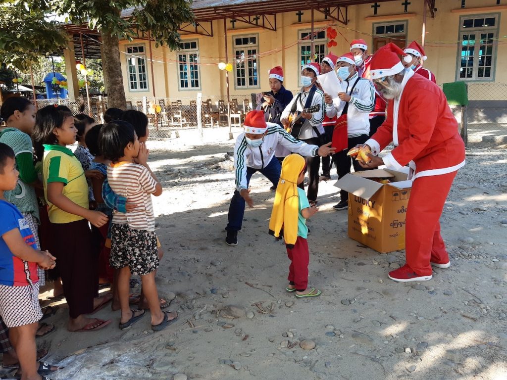 Fr. Girish Santiago, SJ as Santa Claus