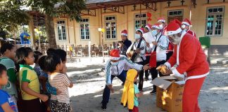 Fr. Girish Santiago, SJ as Santa Claus