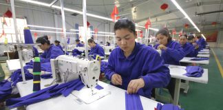 Uyghur women working in a cloth factory
