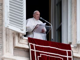 Pope Francis on the balcony overlooking St. Peter's Square