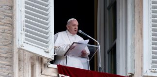 Pope Francis on the balcony overlooking St. Peter's Square