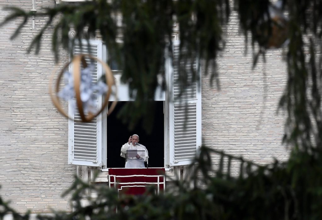 Pope Francis delivers the Sunday Angelus prayer from the window of his study