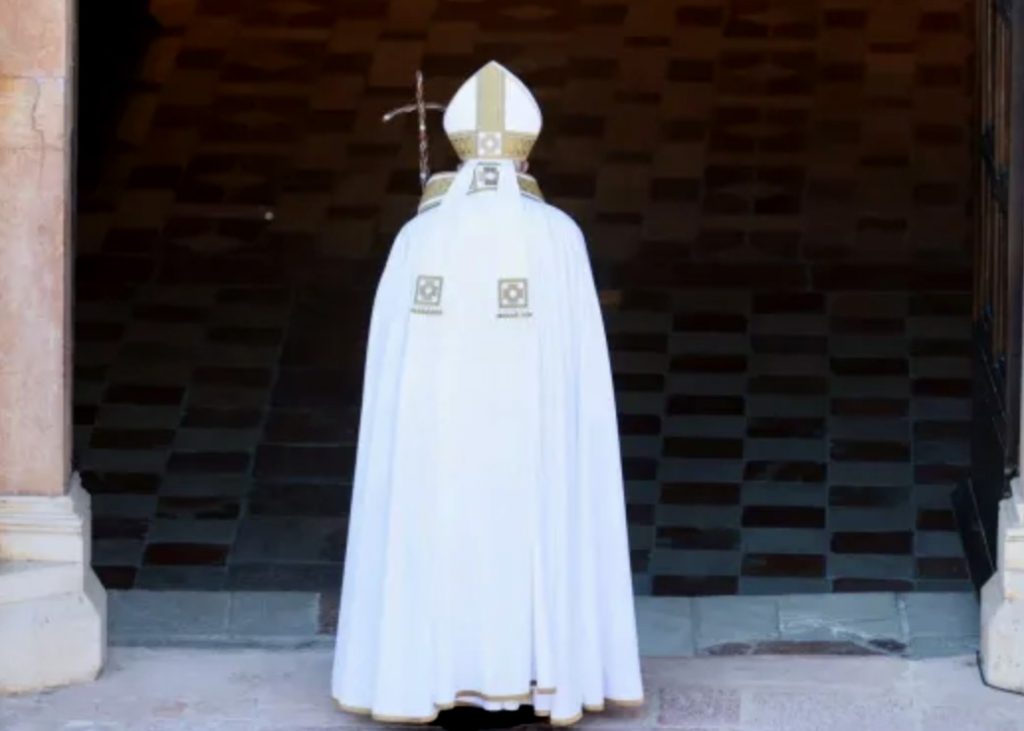 Pope Francis opens the Holy Door of a 13th-century basilica in L’Aquila