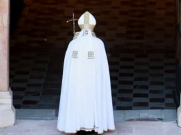 Pope Francis opens the Holy Door of a 13th-century basilica in L’Aquila