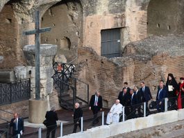 Pope Francis in a wheelchair at the Colisseum