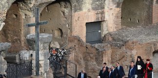 Pope Francis in a wheelchair at the Colisseum