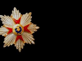 Star of the Knight Grand Cross of the Order of St. Gregory the Great on black suit background