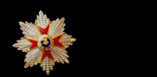 Star of the Knight Grand Cross of the Order of St. Gregory the Great on black suit background