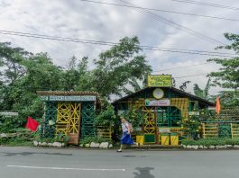 A school girl walks past recycling center in the Philippines | MRF