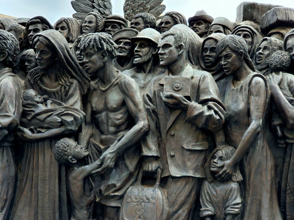 Angels Unaware statue at St. Peter's Square. Migrants, Refugees