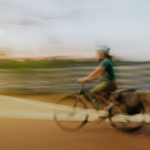 A female cyclist in a blurry photo in the Philippines