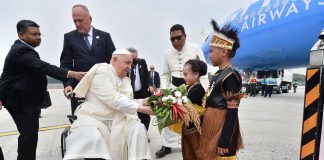 Children welcome Pope Francis to Indonesia