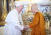 Pope Francis shaking hands with the Supreme Buddhist Patriarch of Thailand