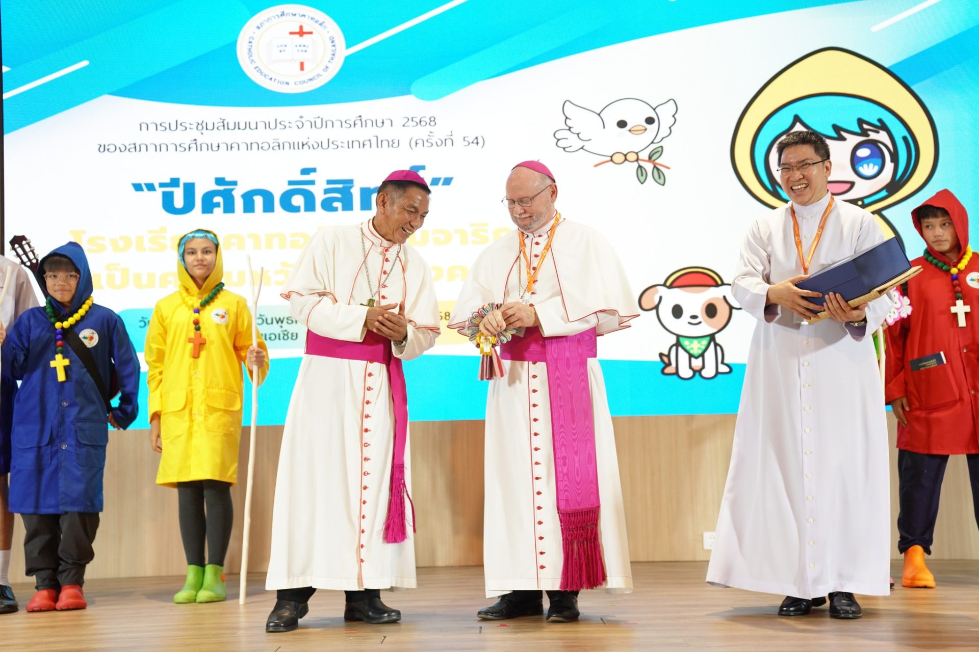Archbishop Peter Bryan Wells and Bishop Stephen Boonlert Promsena on stage at 54th Annual Conference of the Catholic Education Council of Thailand (CECT)