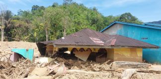 Destroyed school building after flooding in Indonesia