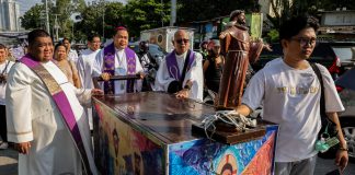 PHOTOS: Urban poor turn Lenten rites into call for housing justice in the Philippines
