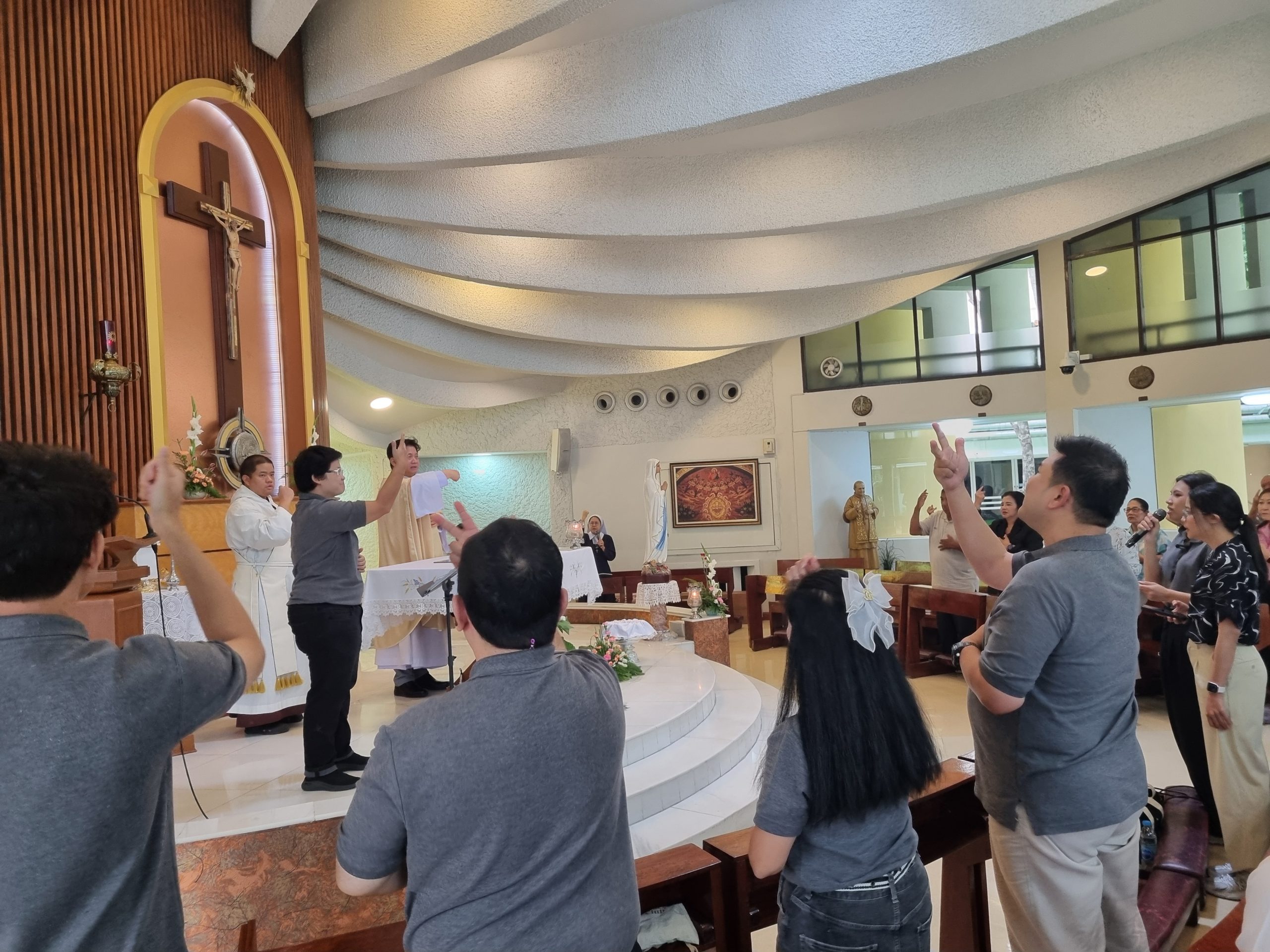 In the language of signs, Deaf Catholics celebrate Trinity Sunday in Bangkok